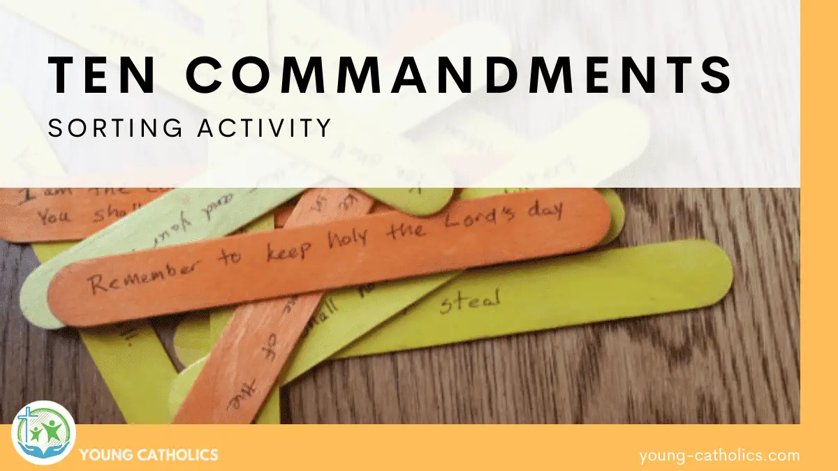 A set of yellow and orange craft sticks, with the 10 commandments written on them, jumbled in a pile for this Ten Commandments activity.